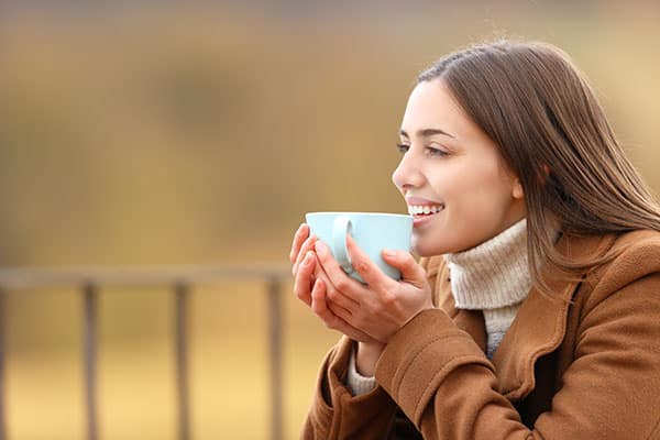 Young woman outside with beuatiful skin.